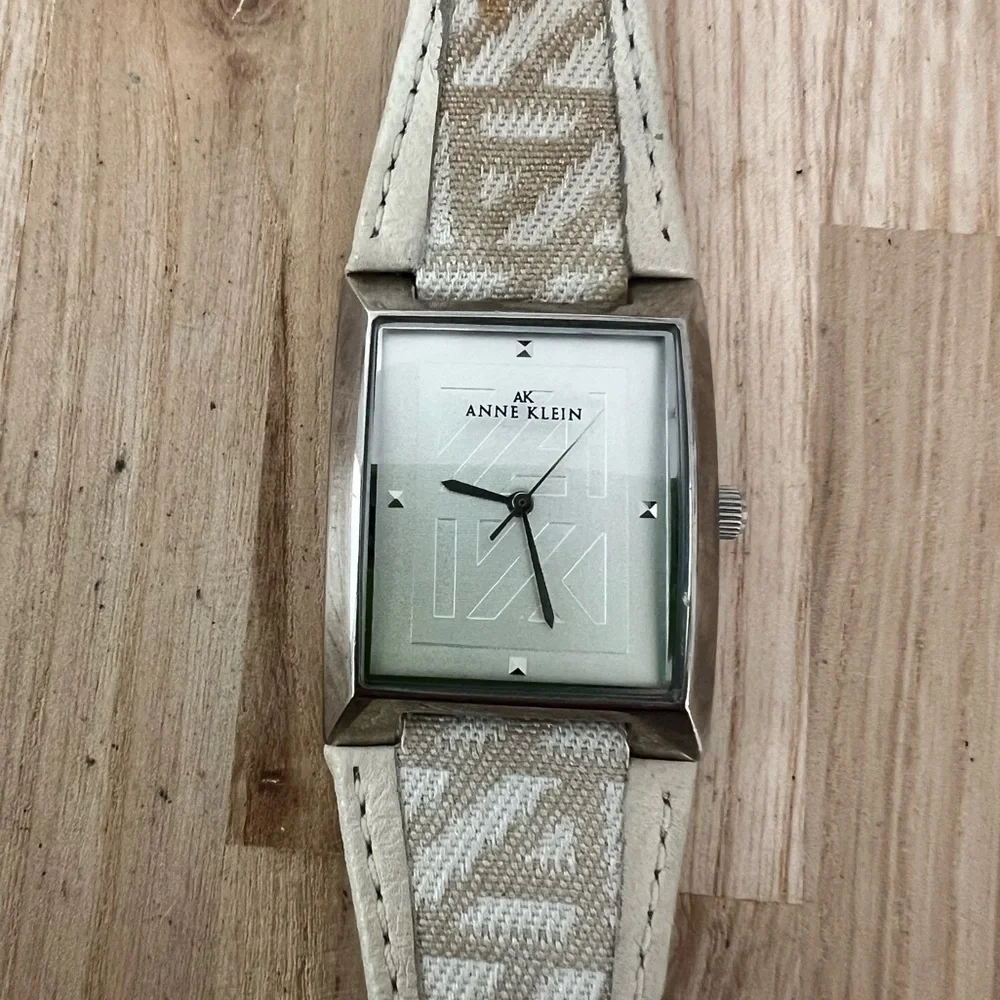 Anne Klein ladies rectangular silver tone dress watch NEW BATTERY